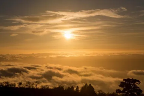 Sunset in the sea of clouds in La Palma