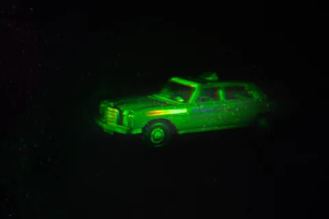 White light hologram of a model car