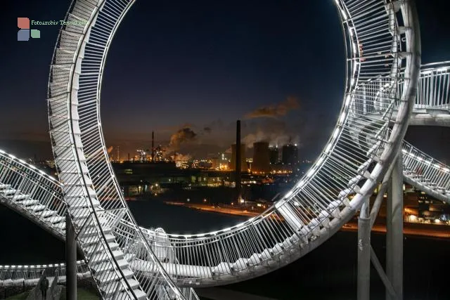 Tiger and Turtle with a view of the power plant and smelting works