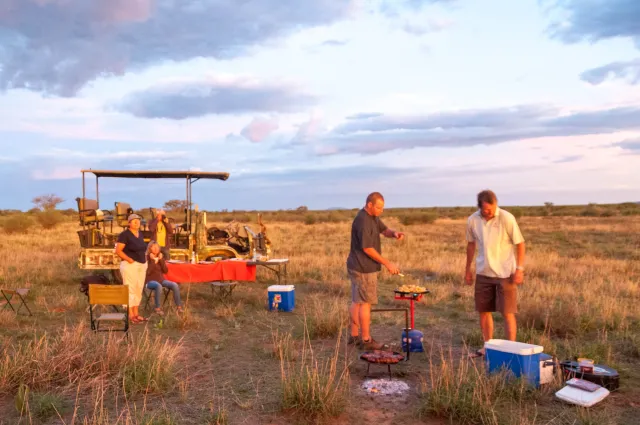 Barbecue at sunset in the savannah