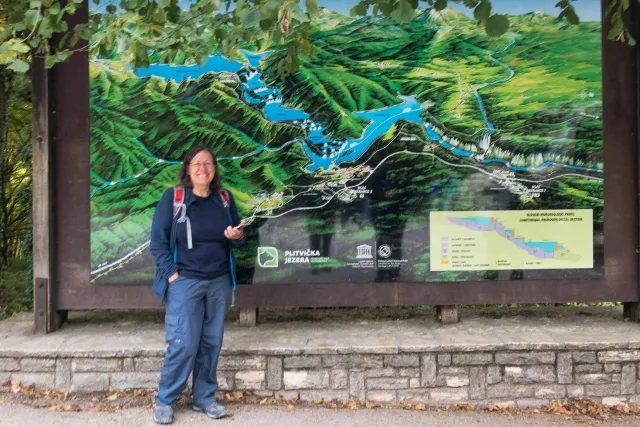 Karin in front of the overview map