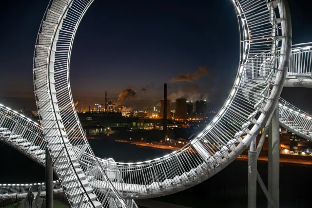 Tiger and Turtle with a view of the power plant and smelting works